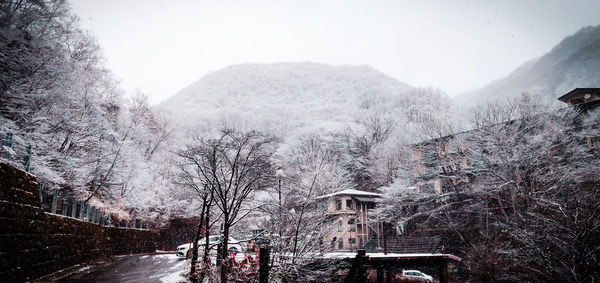 Snow covered mountain against sky