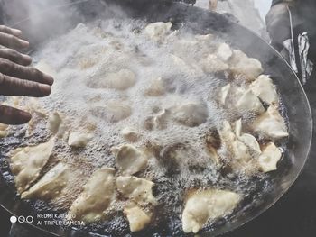 Midsection of person preparing food