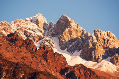 Scenic view of rocky mountains against clear sky