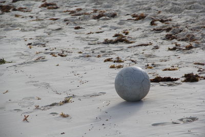 Close-up of ball on beach