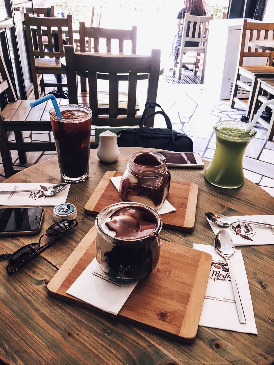 table, drink, food and drink, refreshment, coffee, cup, coffee - drink, still life, mug, coffee cup, no people, indoors, wood - material, freshness, food, cafe, high angle view, household equipment, day, kitchen utensil, glass