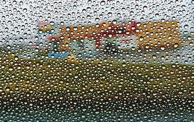 Close-up of water drops on glass