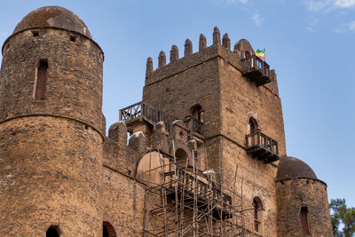 Low angle view of historic building against sky