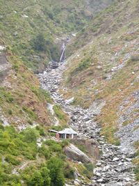 Scenic view of waterfall on mountain