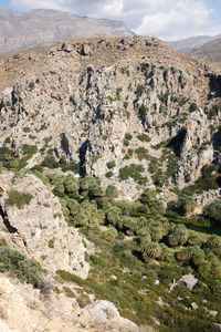 Scenic view of rocky mountains against sky