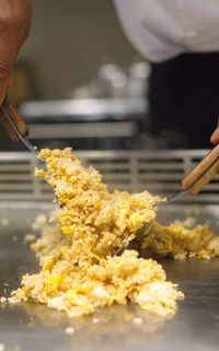 Close-up of hand holding food