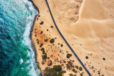 High angle view of sand on beach