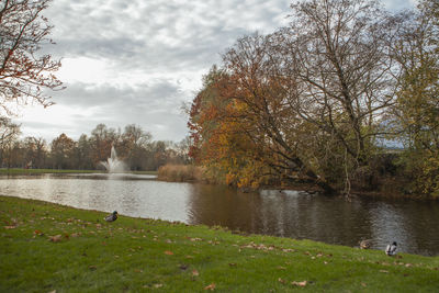 Scenic view of lake against sky during autumn