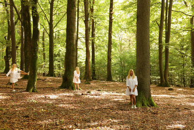 Rear view of woman standing in park