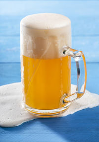 Close-up of beer glass on table