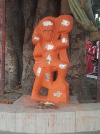 Close-up of statue against building wall