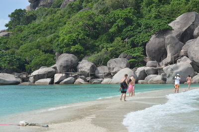 Tourists on rock