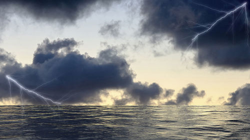 Lightning over sea against sky