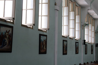 Low angle view of building seen through window