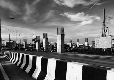 Incomplete bridge against sky