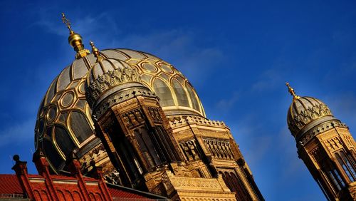 Low angle view of statue of cathedral against sky