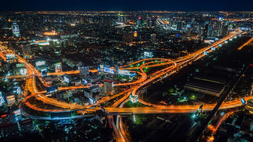 High angle view of illuminated city at night