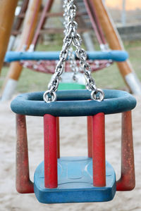 Close-up of swing in park