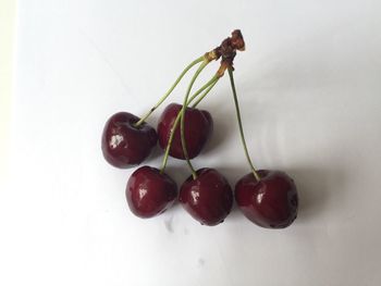 Close-up of strawberry over white background