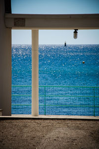 Close-up of sea against blue sky