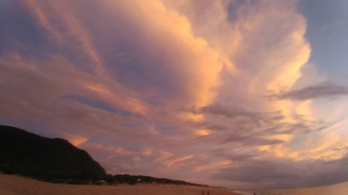 Low angle view of dramatic sky during sunset