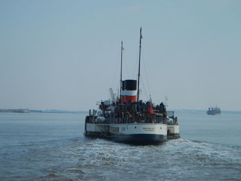 Boat sailing in sea