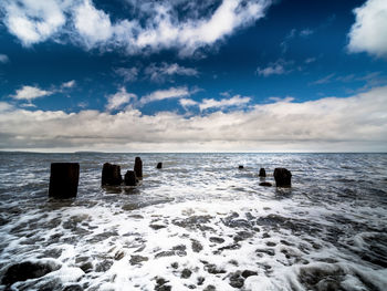 Scenic view of calm sea against sky