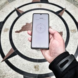 Close-up of hand holding text