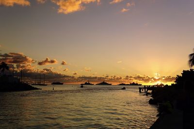 Scenic view of sea against sky at sunset