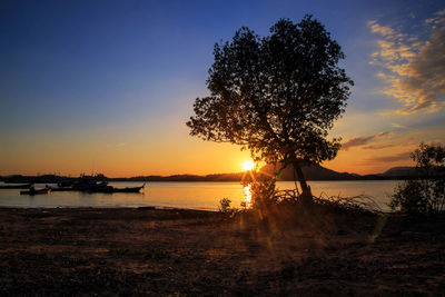 Scenic view of sea against sky during sunset