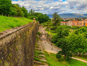 High angle view of buildings in town against sky