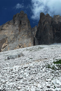 Rock formation on land against sky