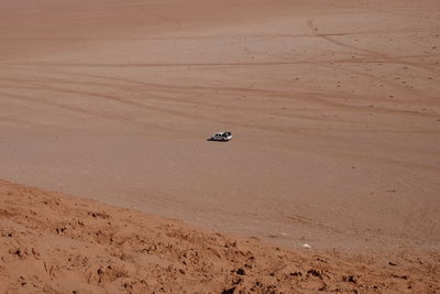 High angle view of vehicle at desert