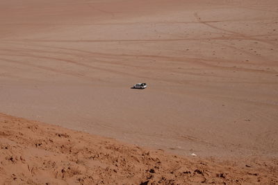 High angle view of vehicle at desert