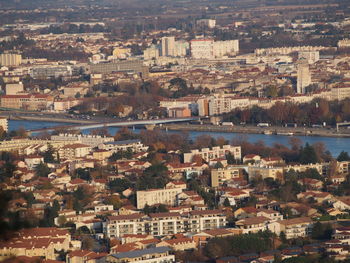 Aerial view of city by river