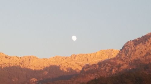 Scenic view of moon against sky at night