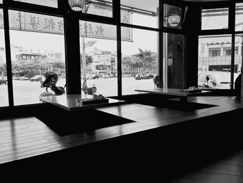 People sitting on table by window