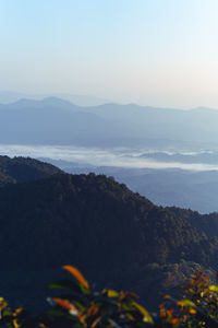 Scenic view of mountains against sky during sunset