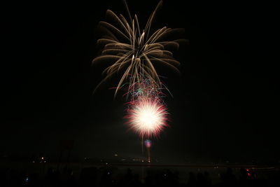 Firework display at night