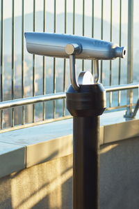 Close-up of padlock on railing