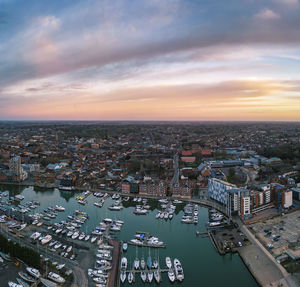 High angle view of cityscape against sky during sunset