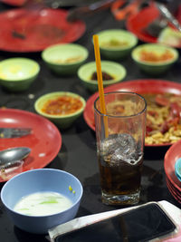 Close-up of beer glass on table