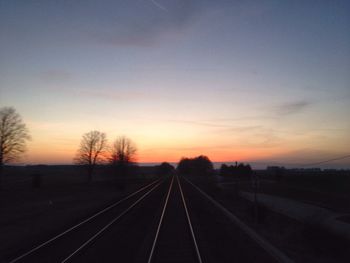 Railroad track at sunset