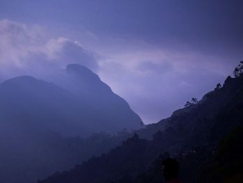 Low angle view of silhouette mountain against sky