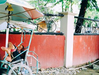 People sitting on wall