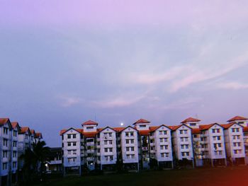 Buildings in city against sky