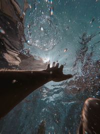 Close-up of person swimming in sea