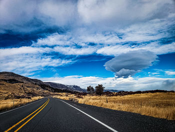 Surface level of empty road along landscape