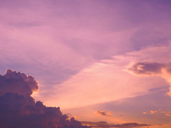 Low angle view of dramatic sky during sunset