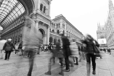 People in front of building